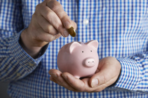 Save business money in piggy bank
